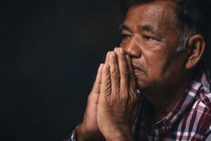 a religious senior is happy and comfortable in faith based senior living and has joined a chaplaincy program on site
