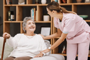 Nurse talks to senior about safety measures for independent living