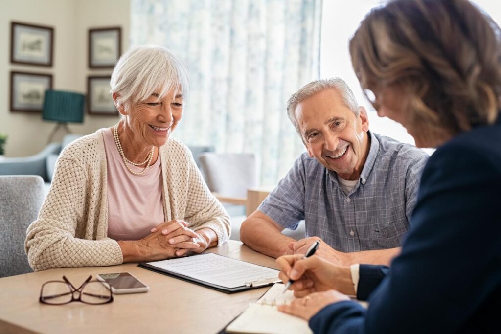 Seniors and adult child talk about considerations when moving to senior living