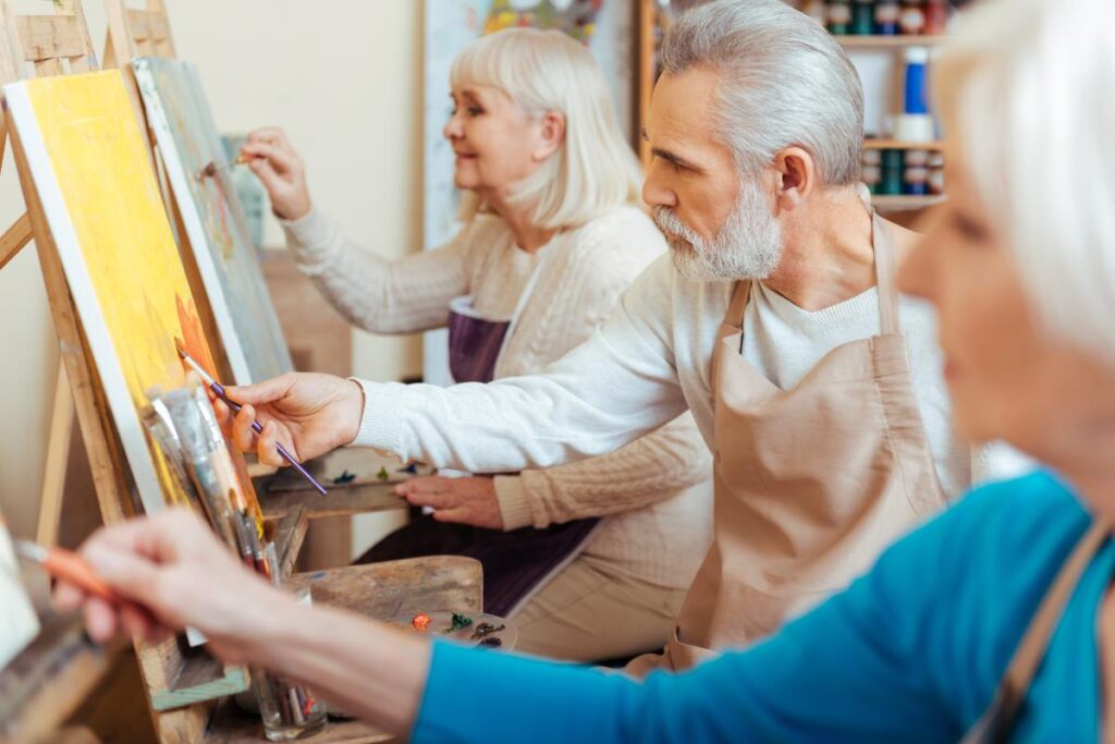 Seniors engaging in activities for seniors in assisted living